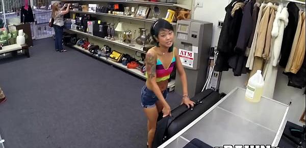  Tiny Asian chick hammered from behind in the pawnshop